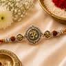 Spiritual rakhi - religious om, ganesha and temple motif rakhis for brothers